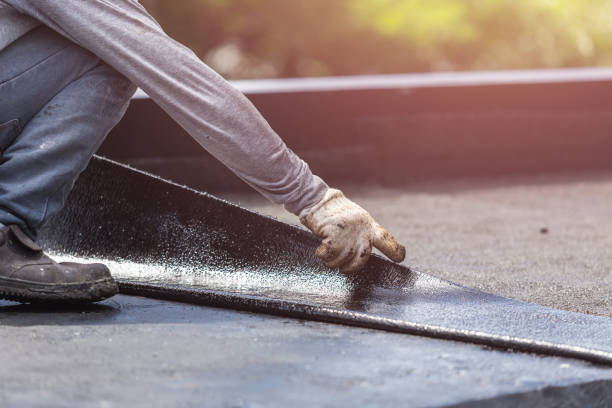 Professional Waterproofing technician working in Saddle River, NJ